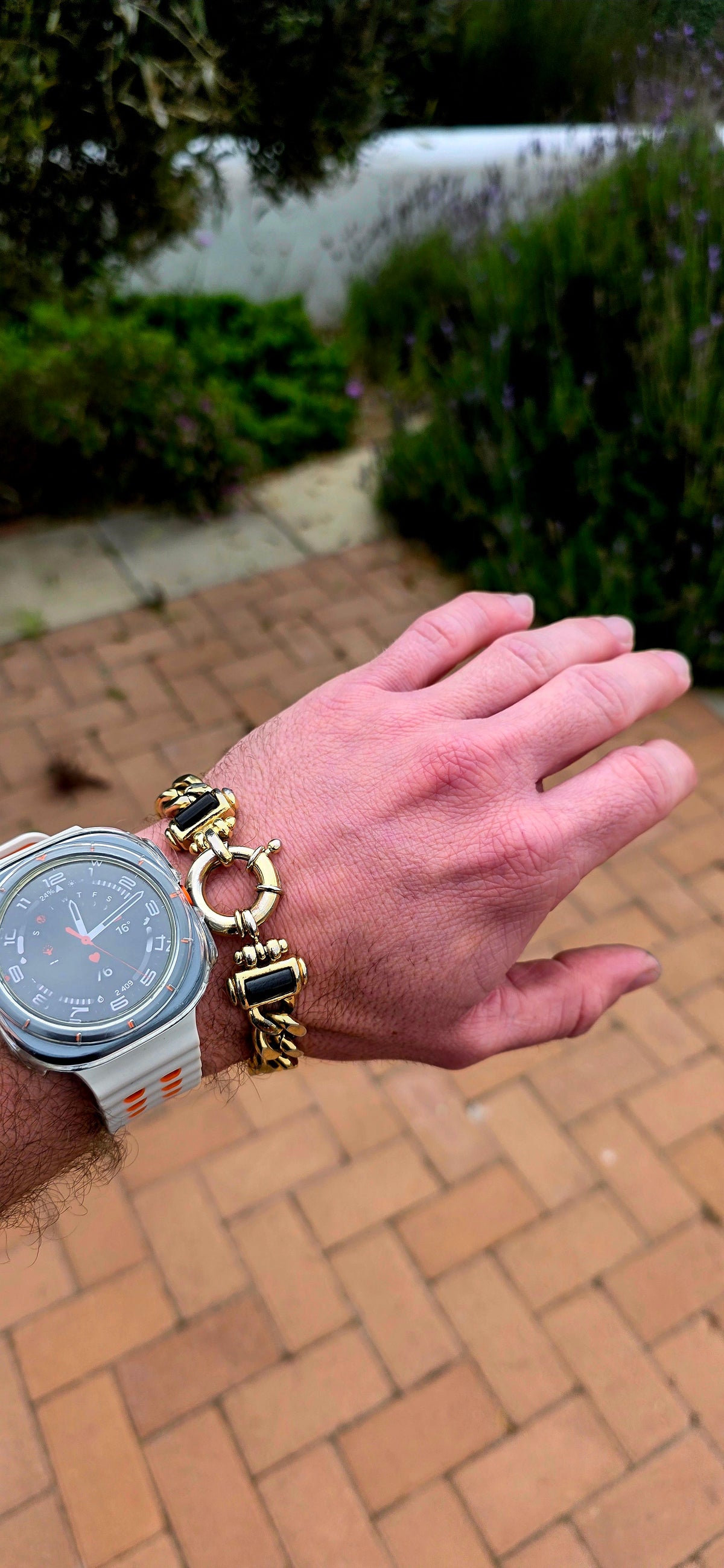 A fabulous vintage 1990s chunky costume bracelet crafted in rich yellow gold plating, featuring oversized, beautifully polished curb links that create a bold, luxurious statement on the wrist!