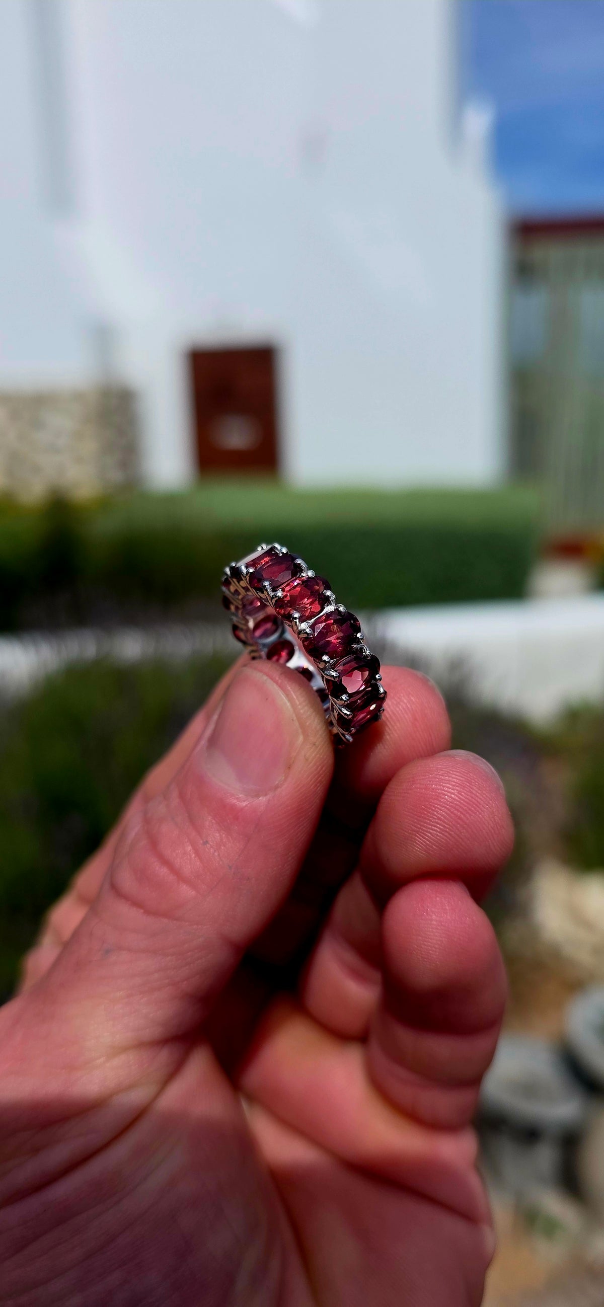Absolutely GORGEOUS full eternity ring, dressed in the most enchanting shades of raspberry red and rich wine!!