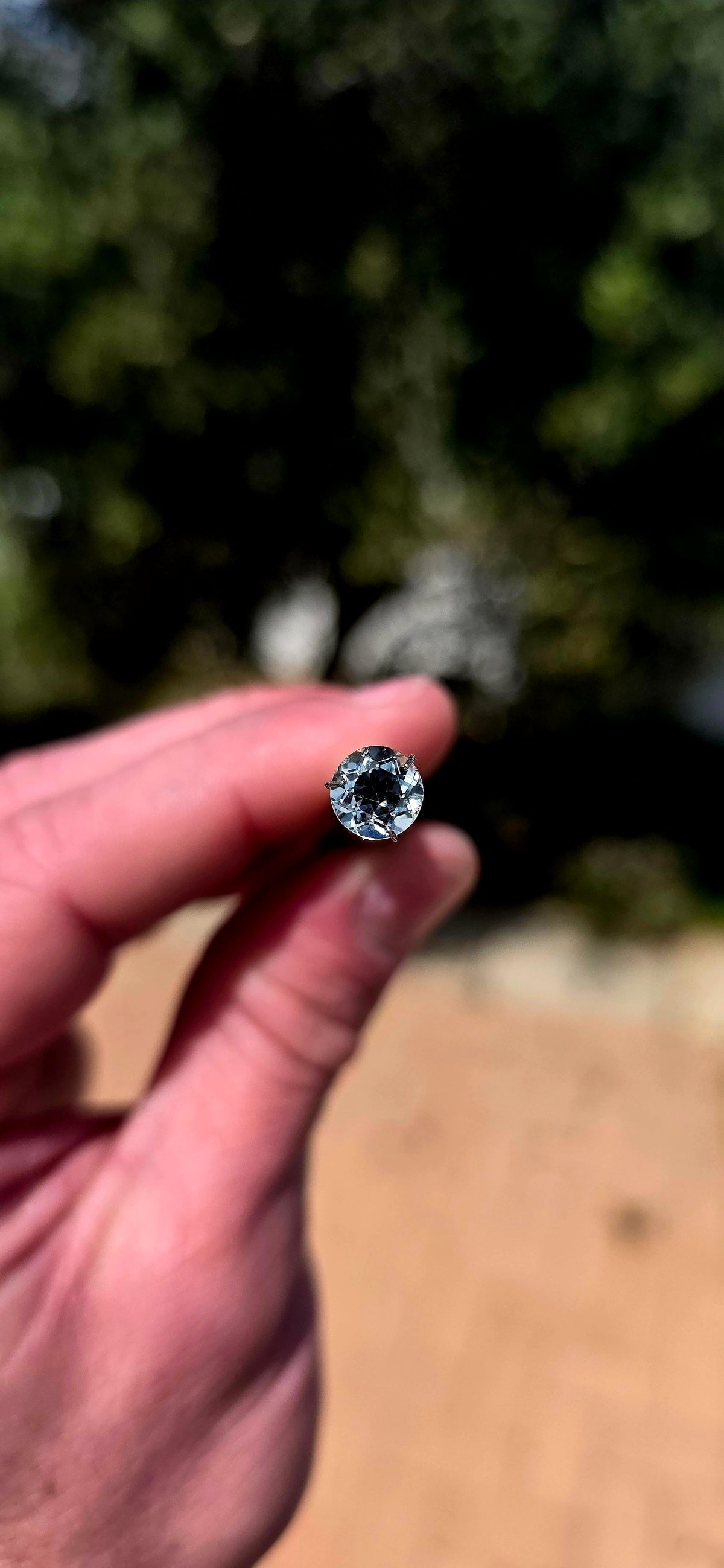 An exquisite unset, round brilliant-cut pale green tourmaline gemstone, just waiting to become part of something truly special!