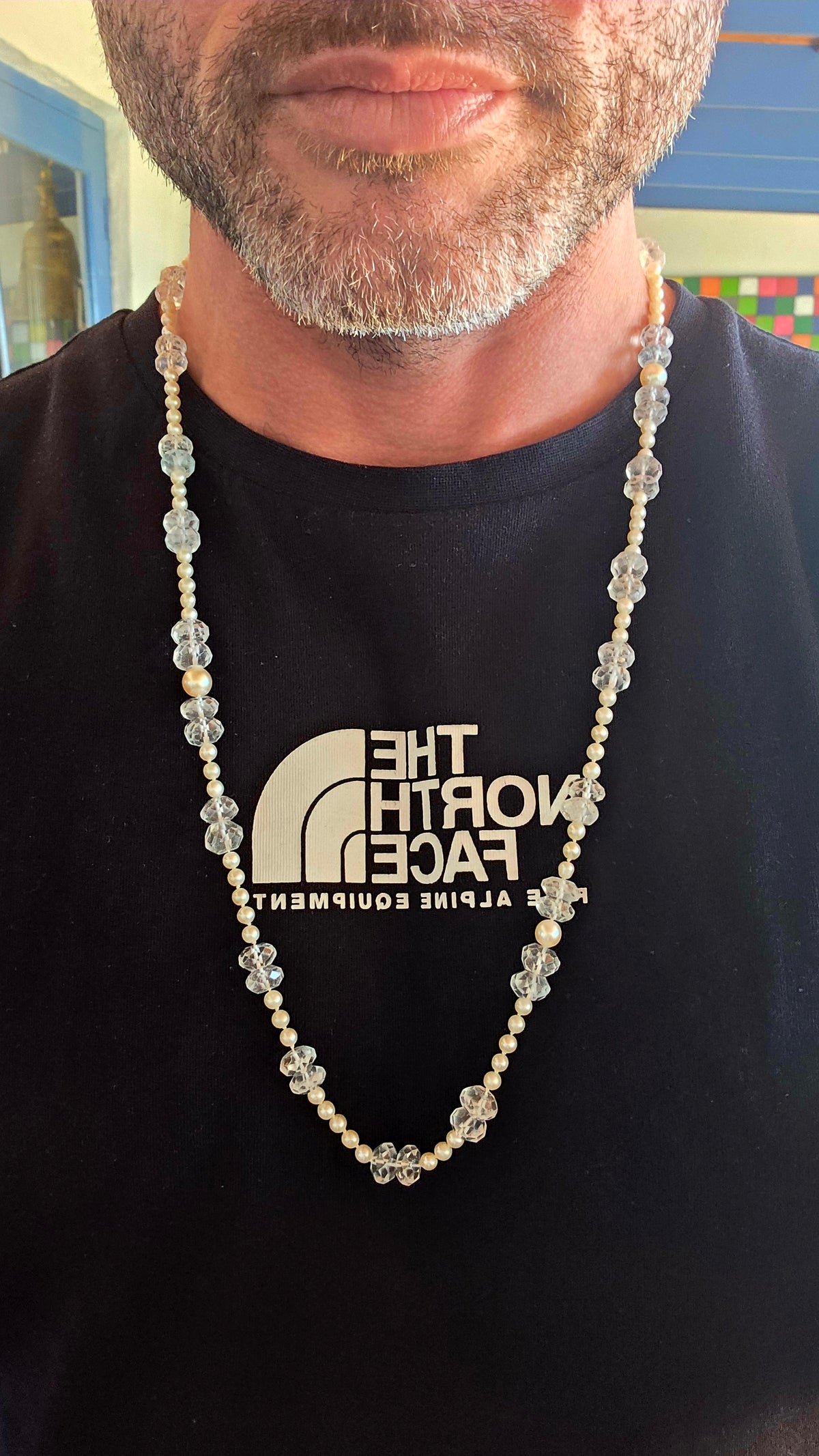 A beautifully delicate, extra-long necklace combining the elegance of Akoya marine cultured pearls with the ethereal sparkle of antique hand-faceted aquamarine gemstones!