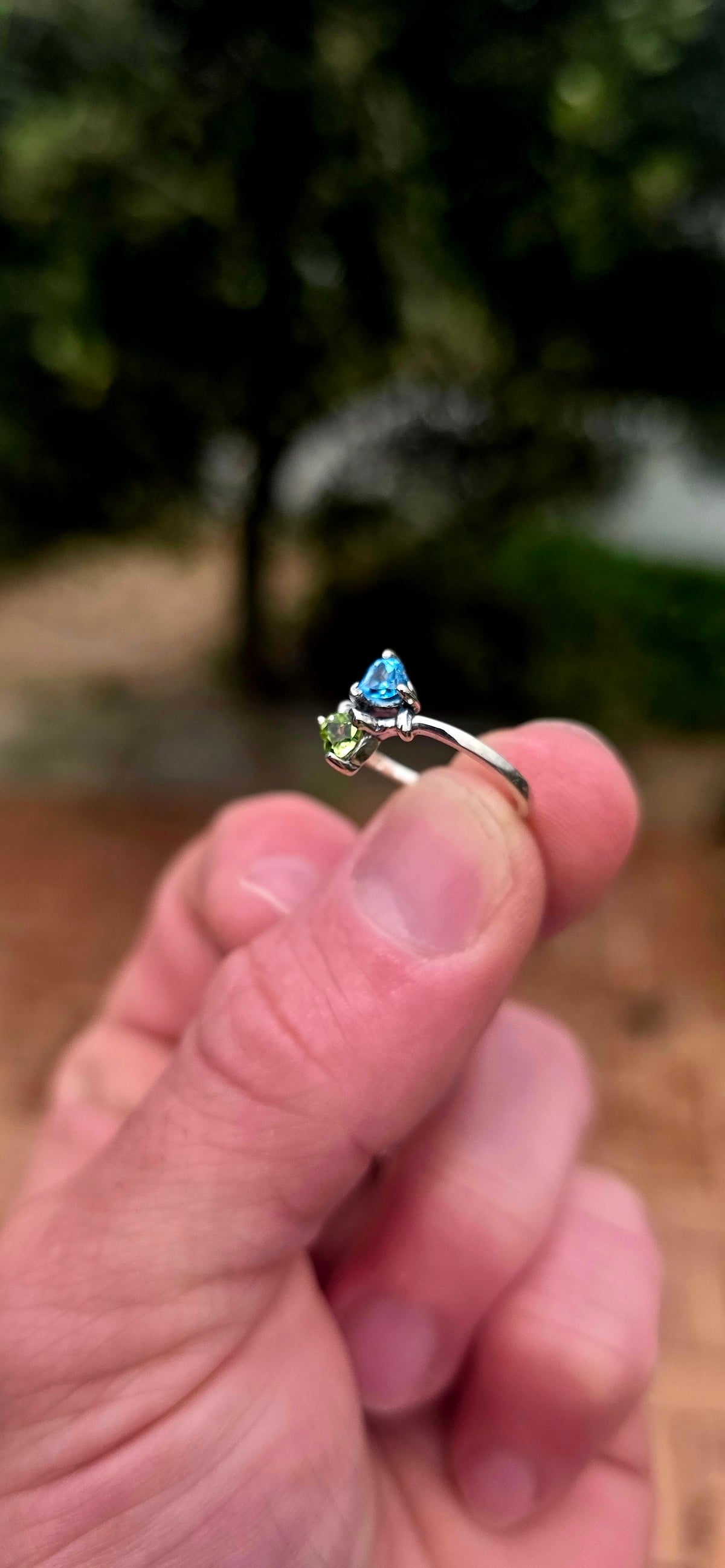 A beautifully dainty and feminine sterling silver Toi et Moi bypass ring, featuring two gorgeous fancy heart-cut gemstones nestled together in a wonderfully romantic design!