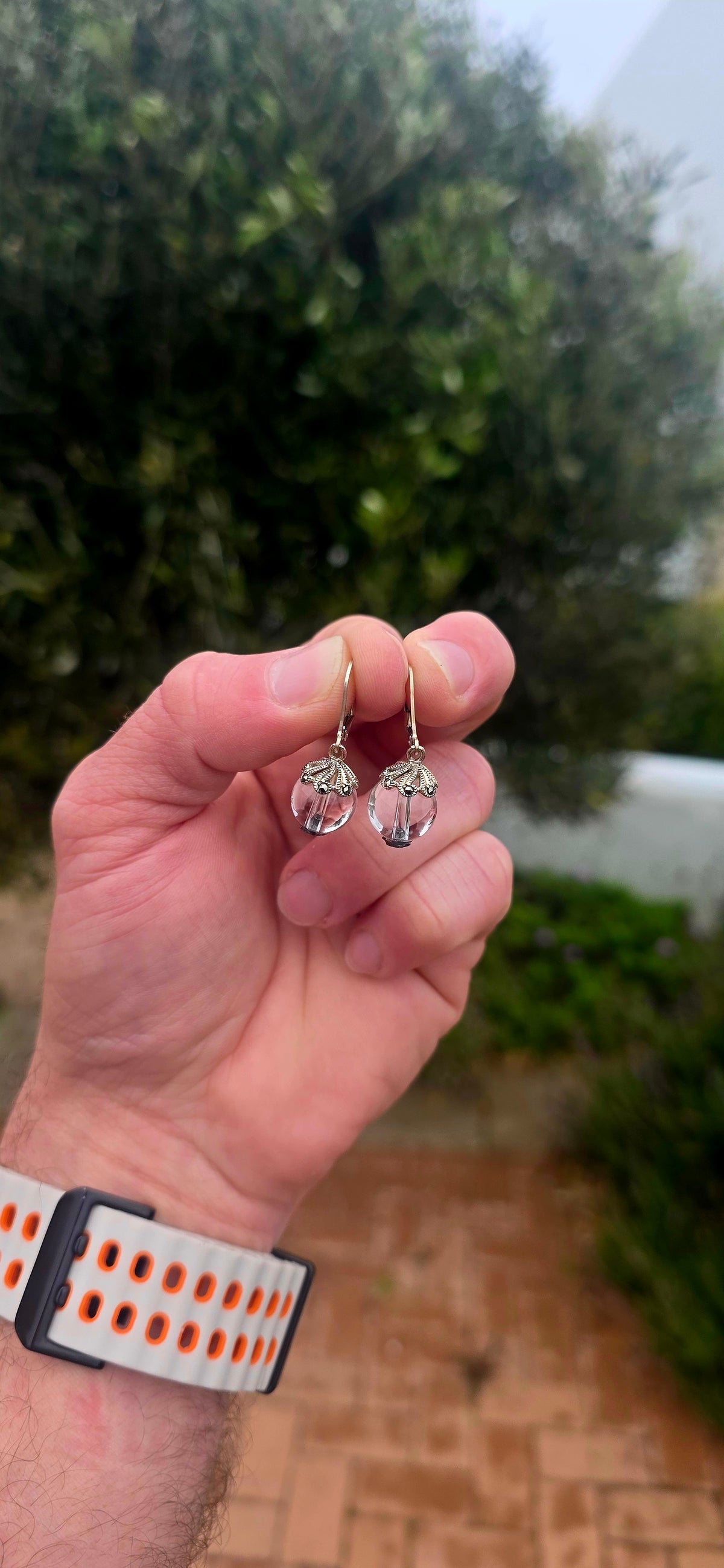 A beautifully feminine pair of Art Deco revival sterling silver Pools of Light drop earrings, combining the beauty of clear rock crystal with delicate vintage-inspired detailing!