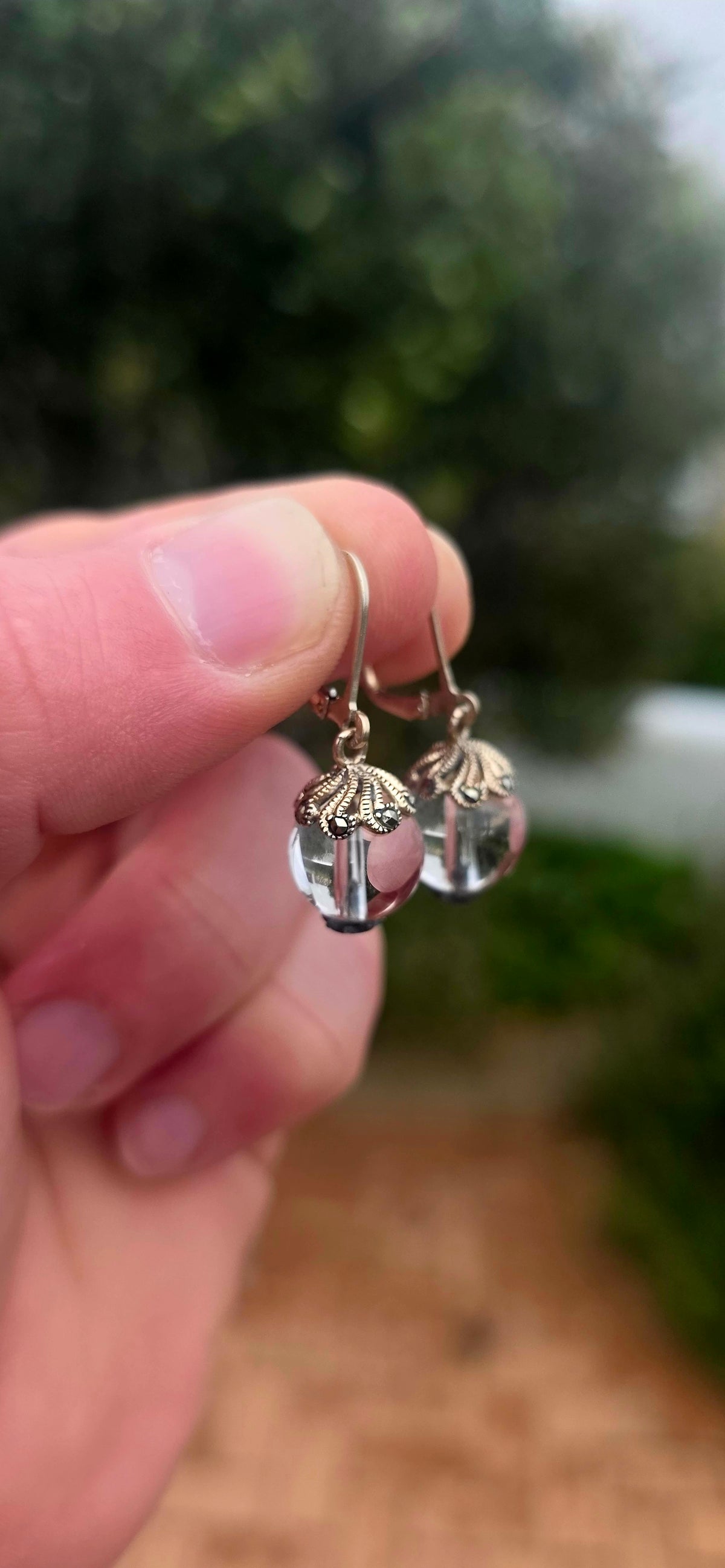 A beautifully feminine pair of Art Deco revival sterling silver Pools of Light drop earrings, combining the beauty of clear rock crystal with delicate vintage-inspired detailing!