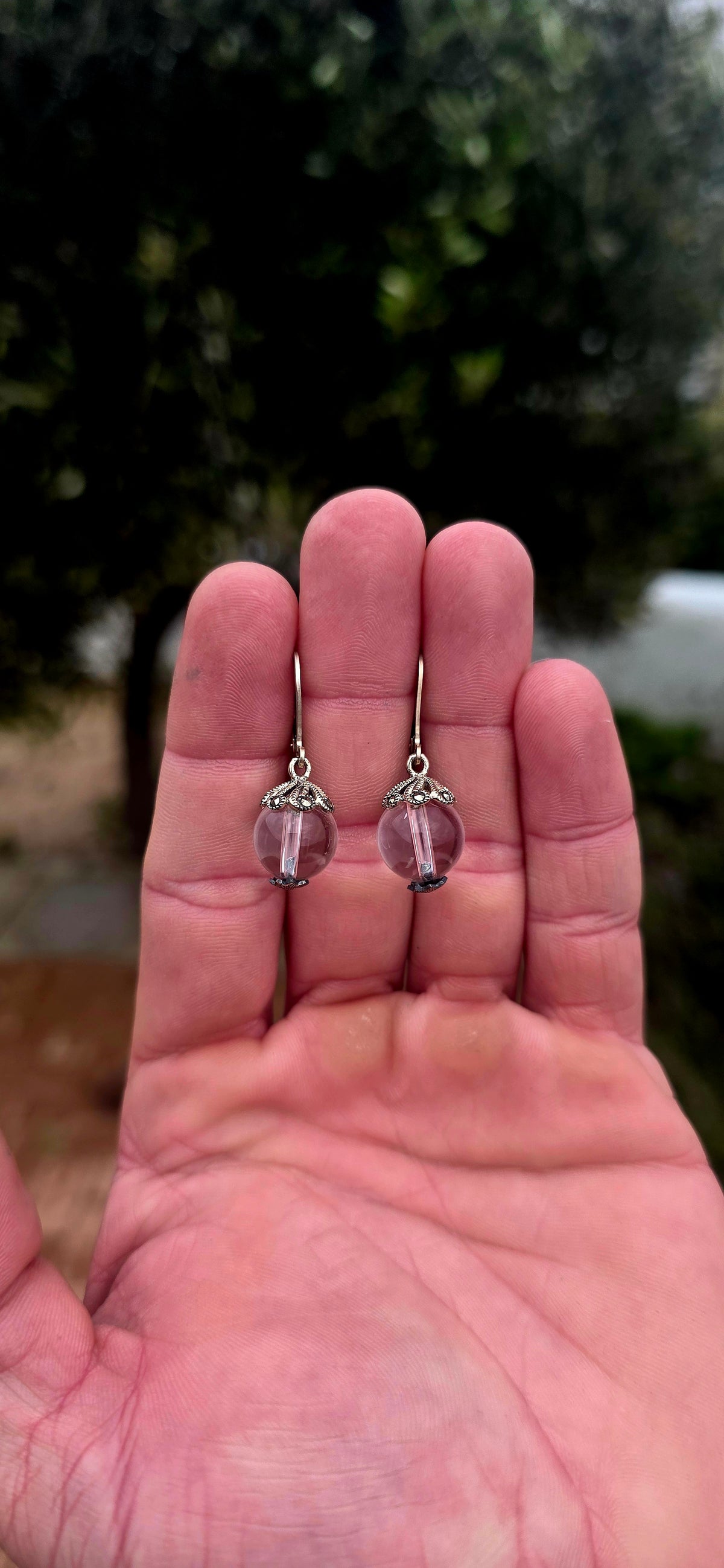 A beautifully feminine pair of Art Deco revival sterling silver Pools of Light drop earrings, combining the beauty of clear rock crystal with delicate vintage-inspired detailing!