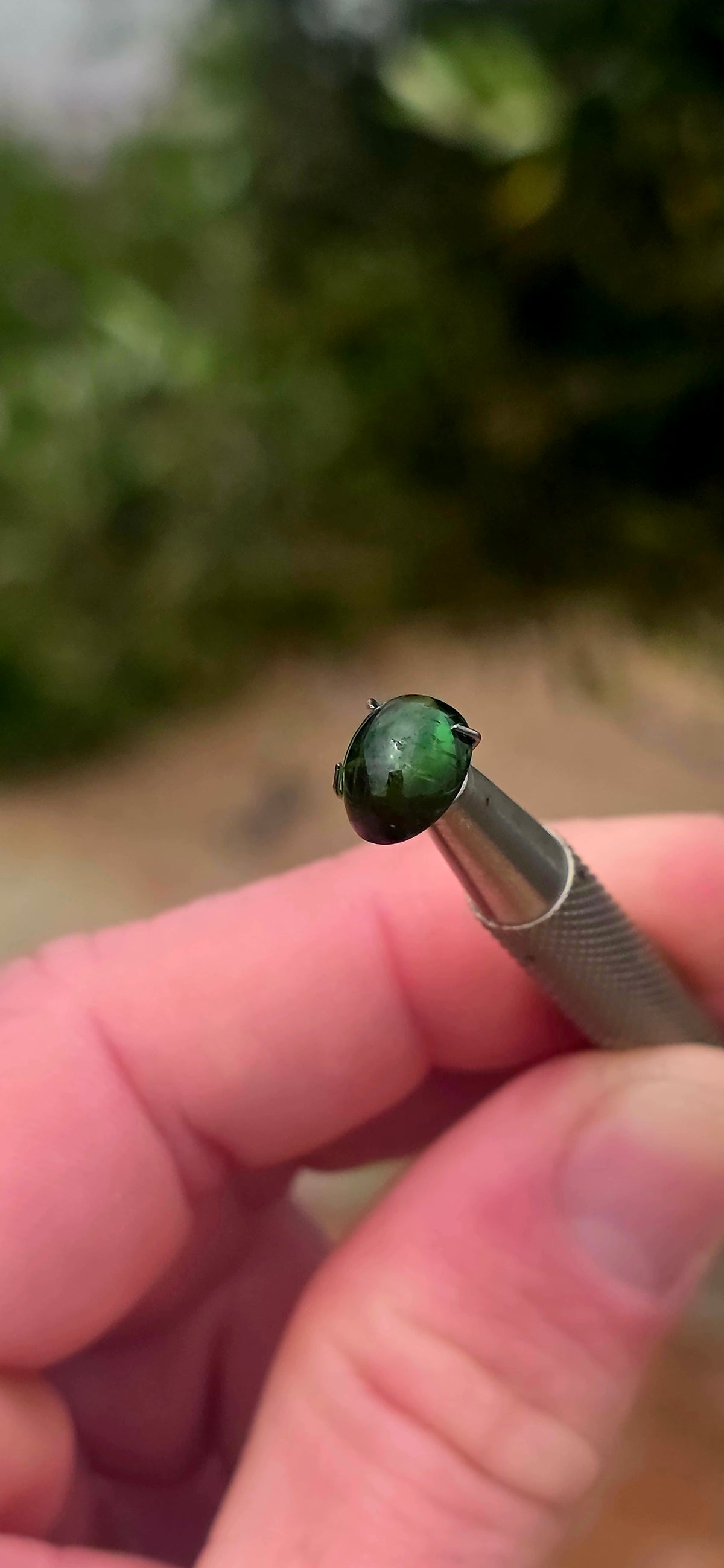 An absolutely BEAUTIFUL unset chrome green tourmaline cabochon, displaying the most enchanting deep forest-green colour with gorgeous flashes of vivid emerald green as the light catches it!