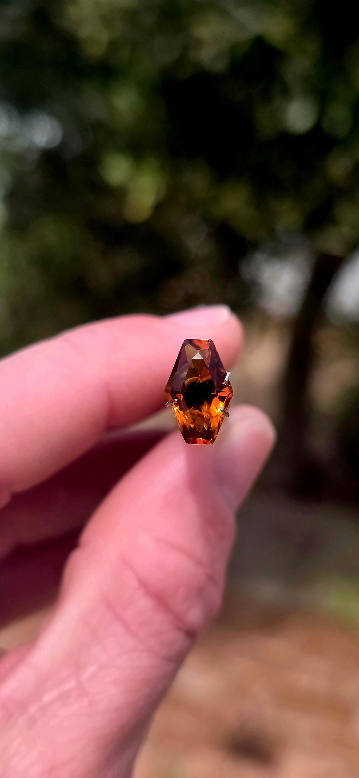 A beautiful unset Madeira citrine gemstone, displaying the most captivating combination of rich burnt orange, golden amber and warm cognac-brown tones!
