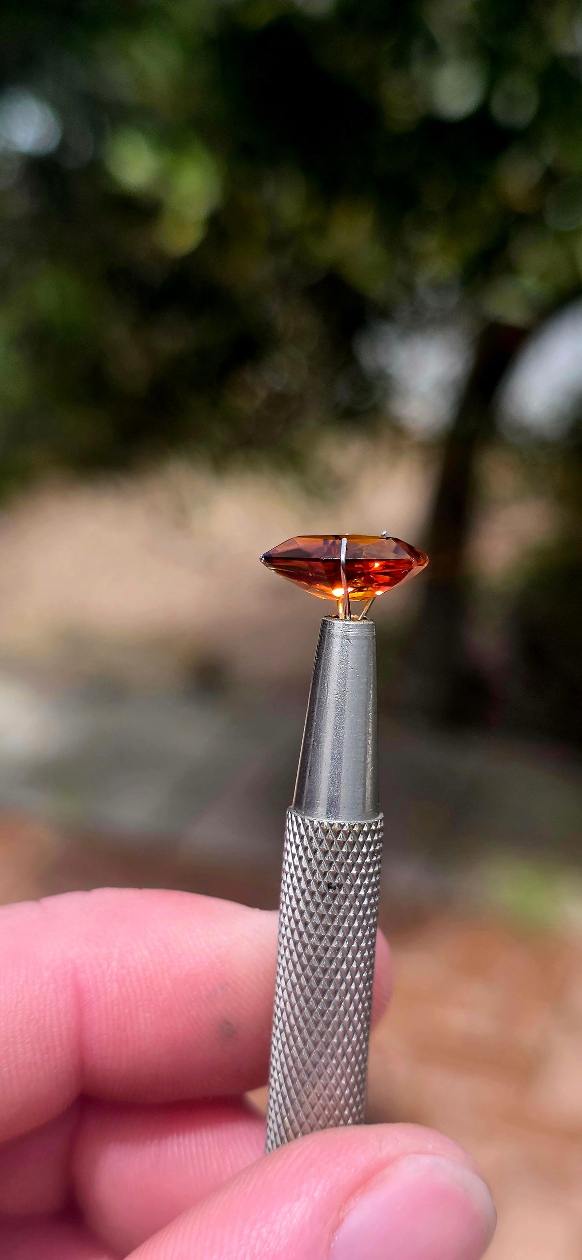 A beautiful unset Madeira citrine gemstone, displaying the most captivating combination of rich burnt orange, golden amber and warm cognac-brown tones!