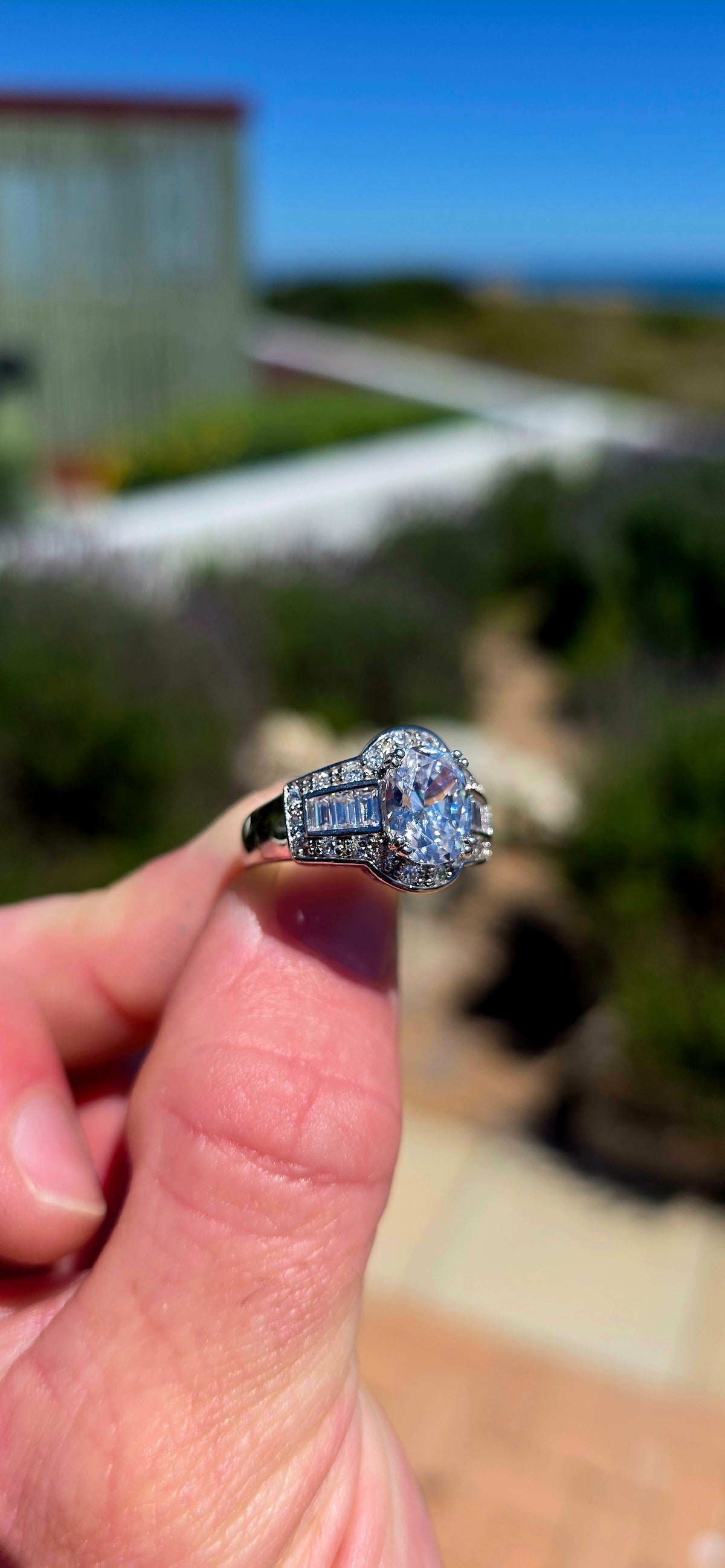 A beautifully crafted sterling silver statement dress ring, combining spectacular sparkle with elegant, Art Deco-inspired detailing.