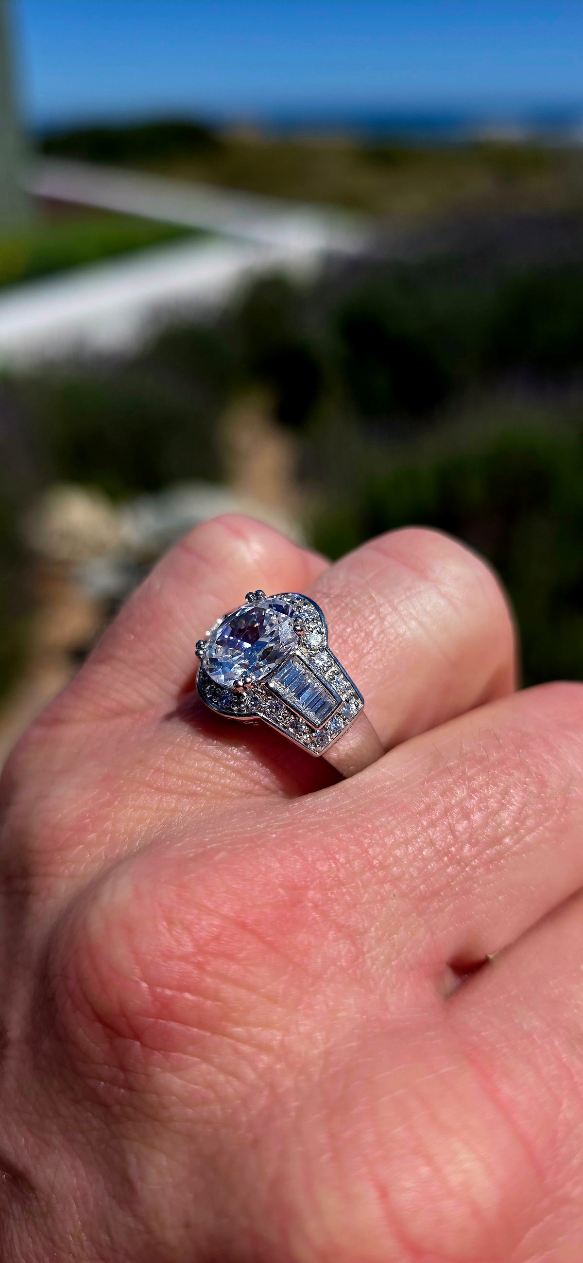 A beautifully crafted sterling silver statement dress ring, combining spectacular sparkle with elegant, Art Deco-inspired detailing.