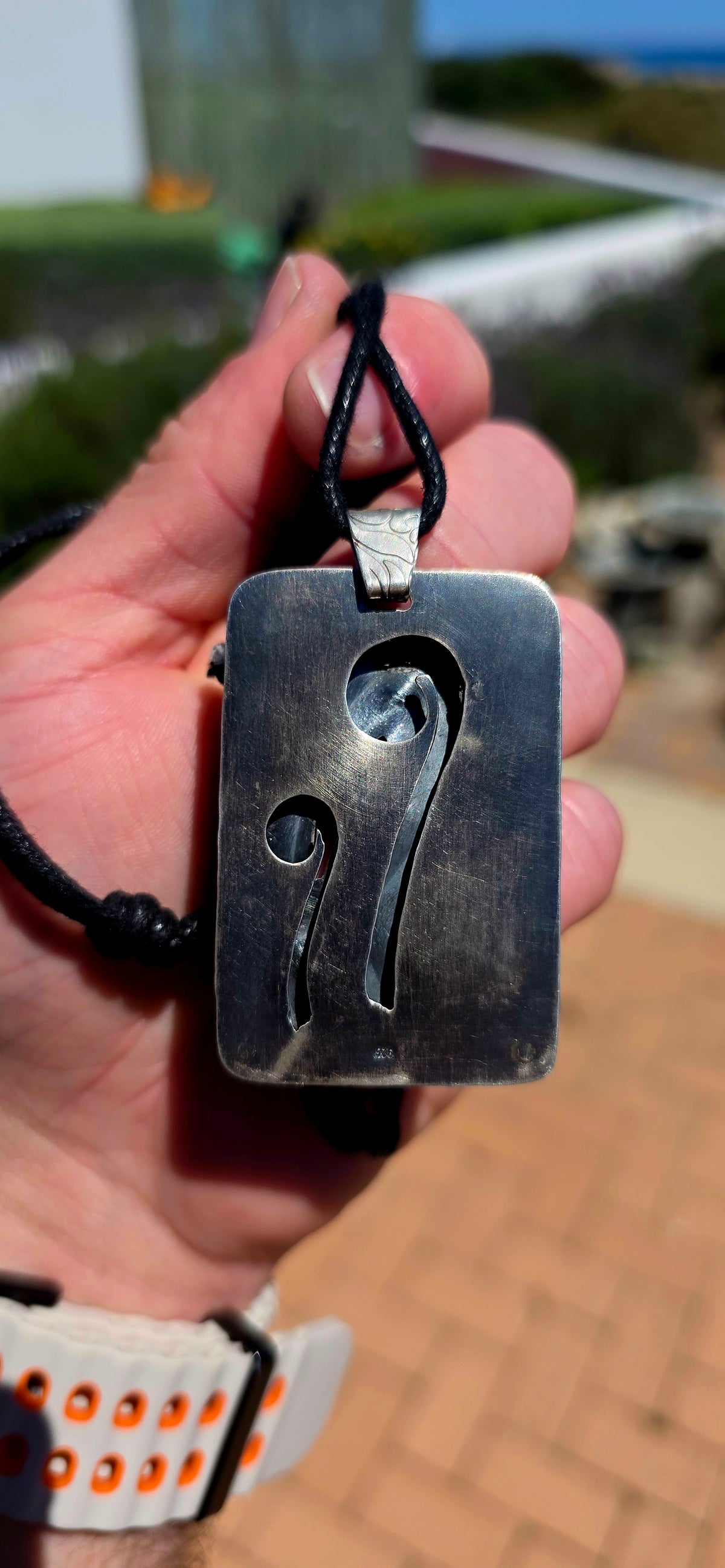 A spectacular oversized, handcrafted sterling silver statement pendant combining architectural design, contrasting metals and the beautiful earthy character of natural agate.