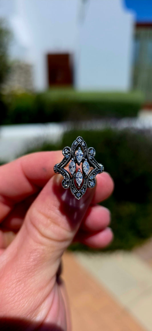 A beautifully ornate vintage-inspired sterling silver dress ring, bursting with old-world elegance and the most magnificent sparkle!