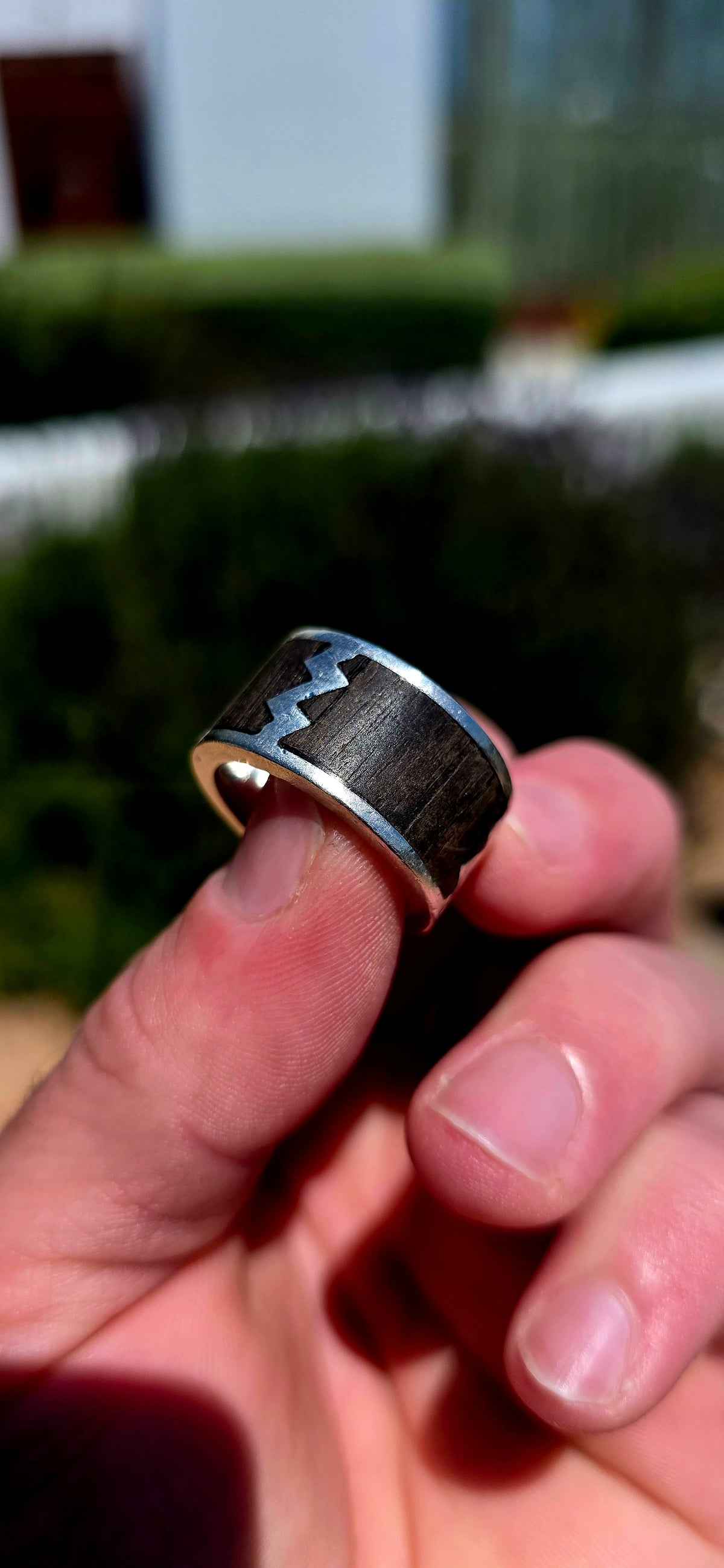 An absolutely fabulous, extra-chunky and wonderfully weighty men's artisan ring, beautifully crafted in solid sterling silver with contrasting dark natural wood inlay!
