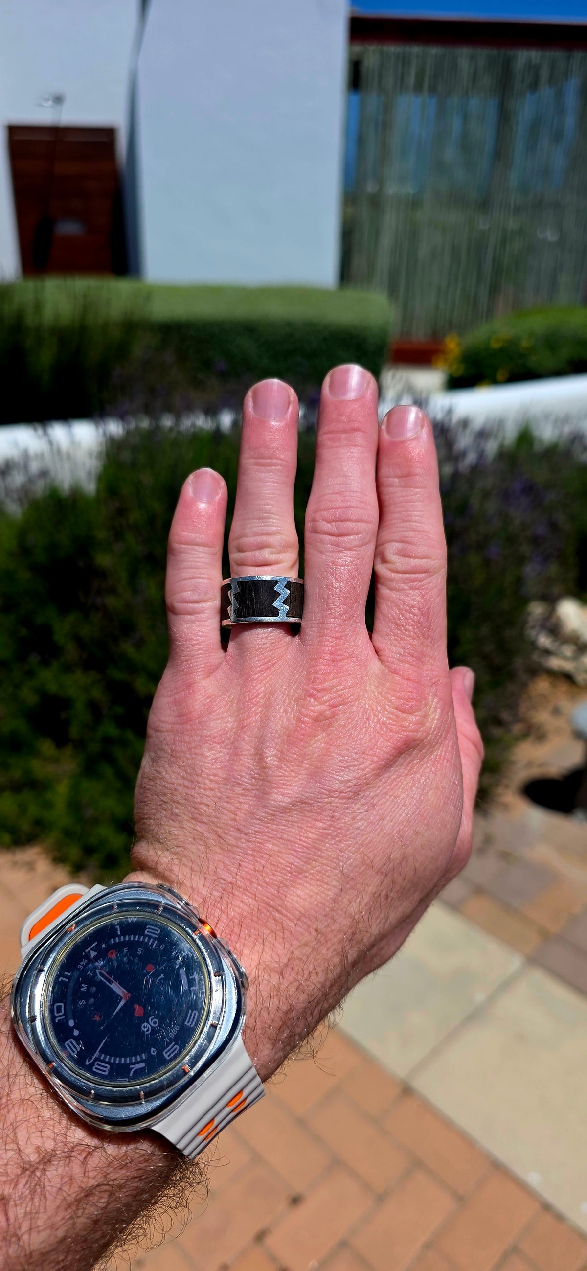 An absolutely fabulous, extra-chunky and wonderfully weighty men's artisan ring, beautifully crafted in solid sterling silver with contrasting dark natural wood inlay!