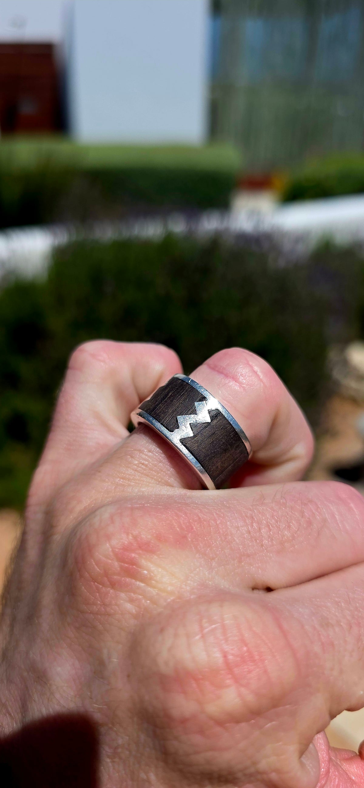 An absolutely fabulous, extra-chunky and wonderfully weighty men's artisan ring, beautifully crafted in solid sterling silver with contrasting dark natural wood inlay!