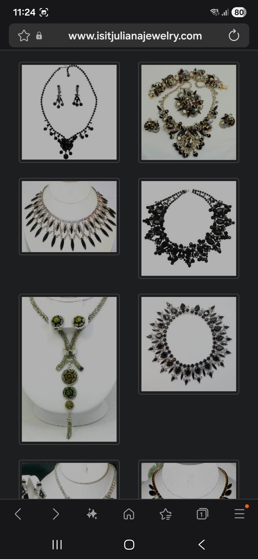 A truly exceptional and highly sought-after vintage treasure, this magnificent 1960s Juliana (DeLizza & Elster) bib necklace embodies bold mid-century glamour at its finest.