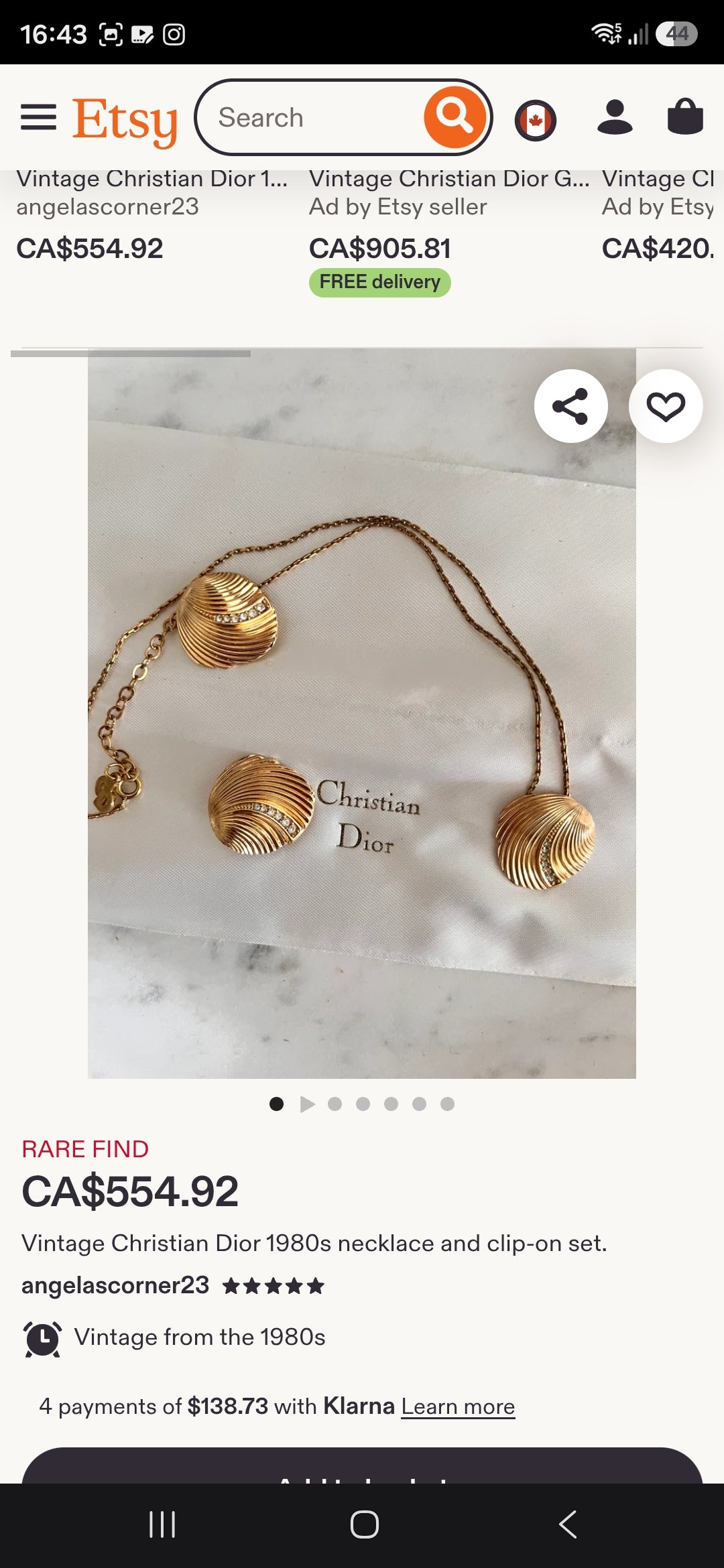 Dating to the 1980s, this striking vintage necklace by D-i-o-r is beautifully crafted in rich gold-plated metal and features an elongated curb-link chain dripping with 15 wonderfully dimensional shell charms.